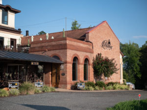 Entrance to Potomac Point Winery with signs for Sheriff Decatur
