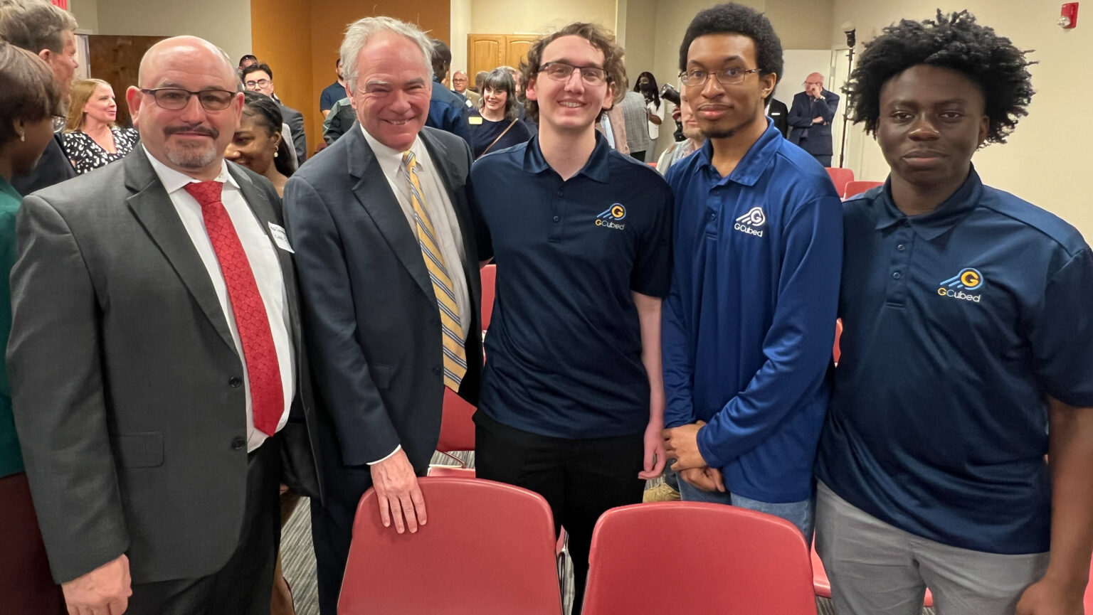 Interns talking to Senator Tim Kaine