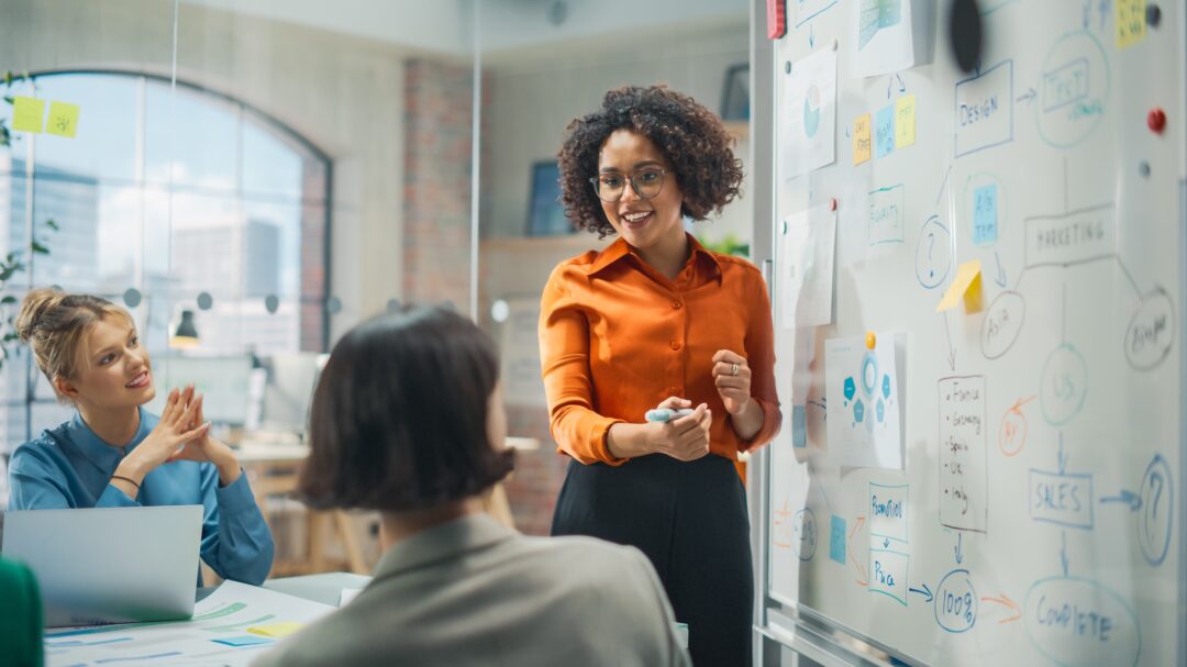 Woman speaking in conference room